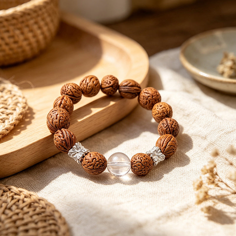 Natural Peach Seed Bracelet – Polished Clear Quartz & Silver Spacer Charm