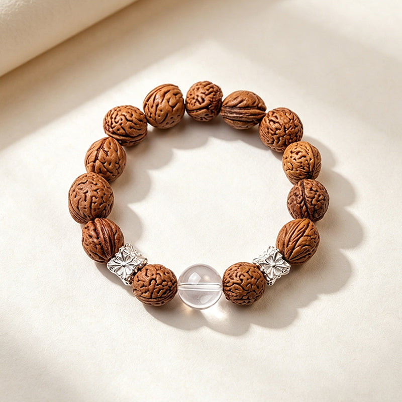 Natural Peach Seed Bracelet – Polished Clear Quartz & Silver Spacer Charm