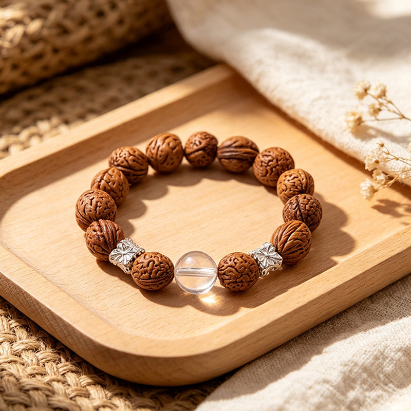 Natural Peach Seed Bracelet – Polished Clear Quartz & Silver Spacer Charm