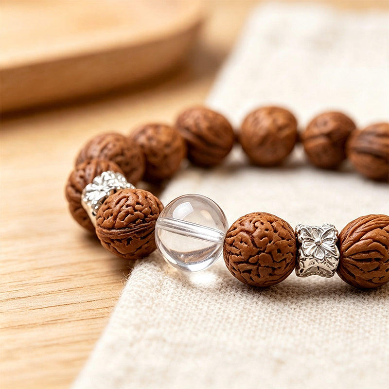 Natural Peach Seed Bracelet – Polished Clear Quartz & Silver Spacer Charm
