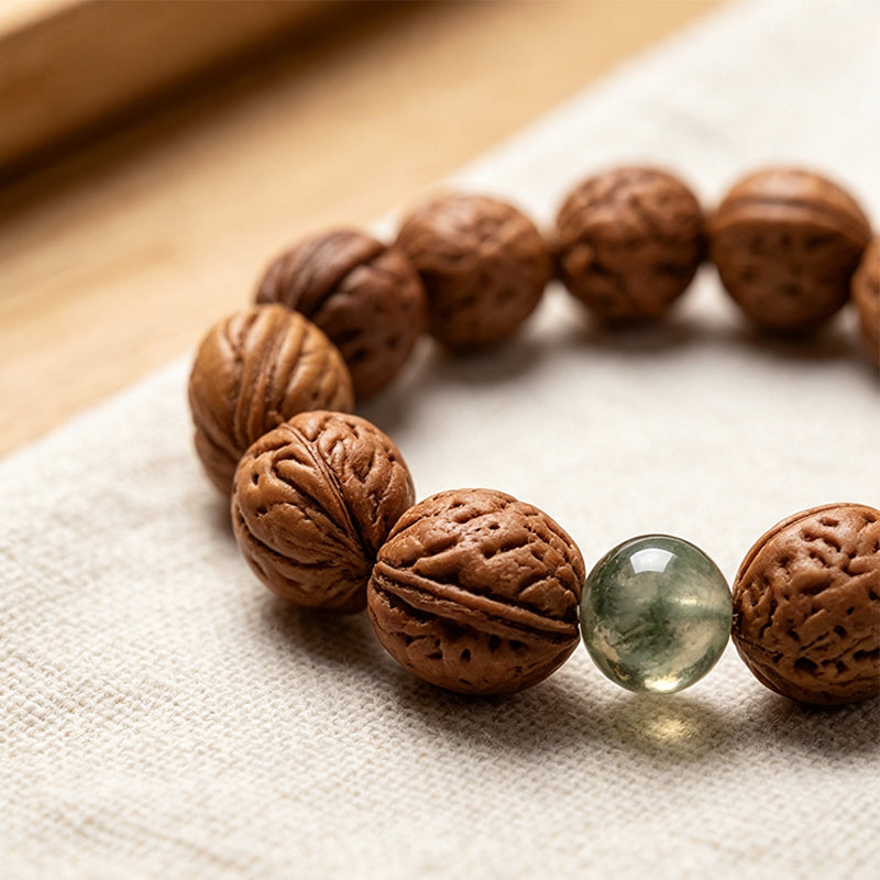 Peach Pit Bracelet with Green Phantom Quartz – Protection & Prosperity Talisman