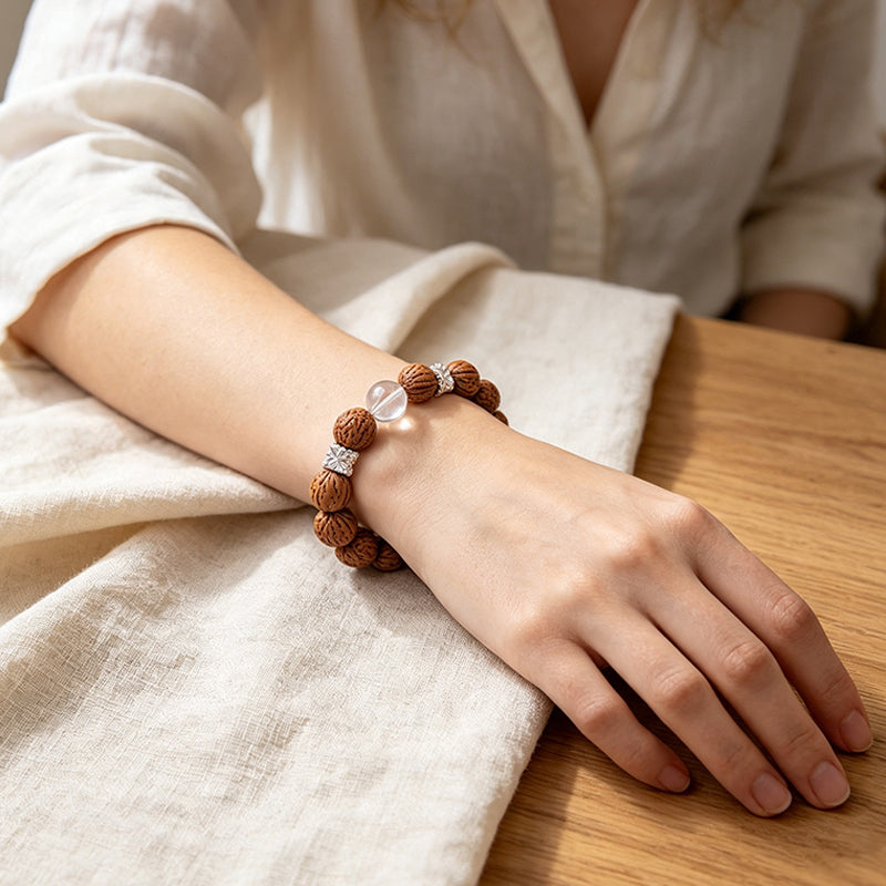 Natural Peach Seed Bracelet – Polished Clear Quartz & Silver Spacer Charm